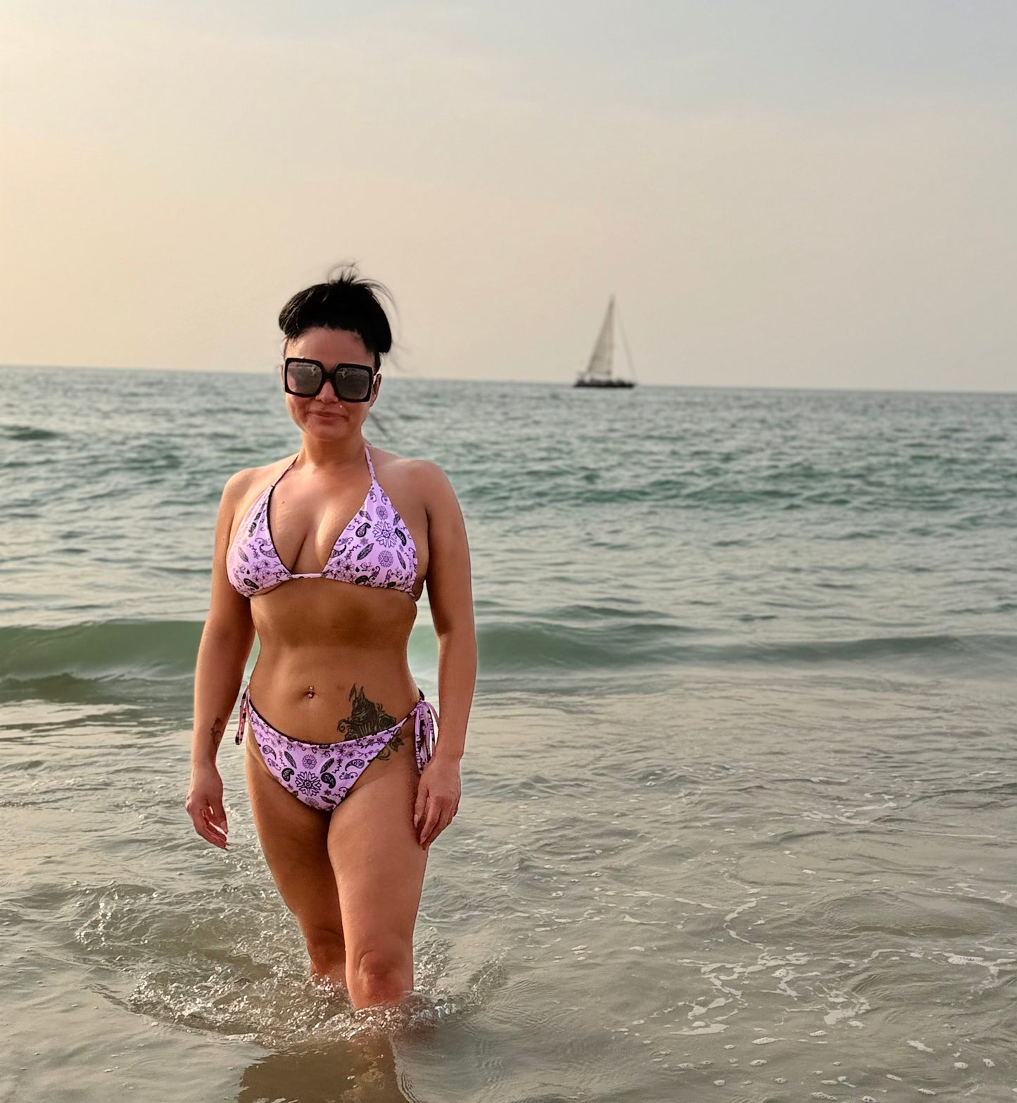 Indigenous owned swim wear pink bikini Carrier sekani woman 