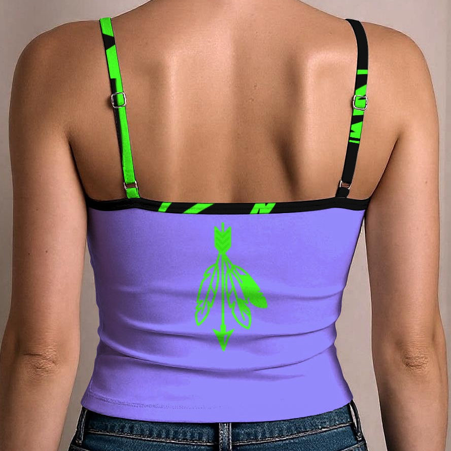 A woman wearing a purple crop top tank Land Back Indigenous fashion